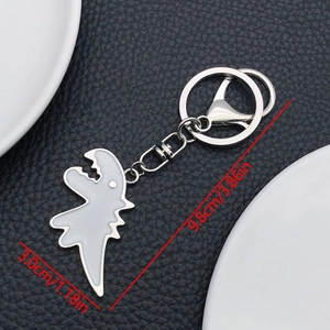 Silver metal dinosaur keychain with white enamel finish and dimensions showing 9.8cm length