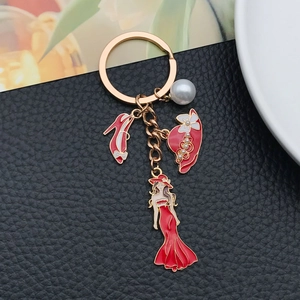 Fashion red dress and high heel keychain with pearl and wide-brimmed hat in gold alloy