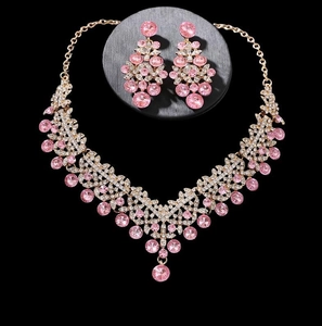 Elegant gold bridal jewelry set with pink crystal floral necklace and earrings