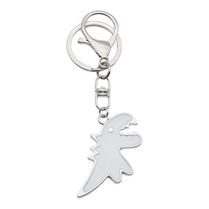 Cartoon white dinosaur keychain featuring a cute T-Rex enamel charm and silver key ring