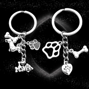Antique silver dog themed keychains with dachshund bone and heart paw charms for pet lovers
