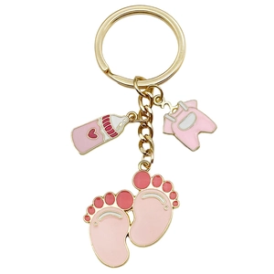 Cute gold baby shower keychain with pink oil-dripped bottle, onesie and tiny footprints