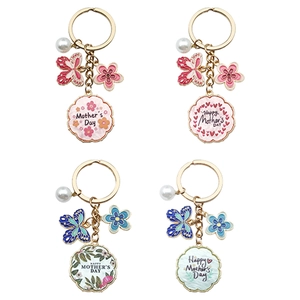 Mother's Day flower keychain set with oil-drop charms and faux pearls on white background