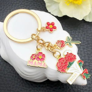 Golden MAMA keychain with red enamel carnation and rose pendants for Mother's Day gift