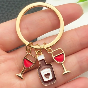 Creative gold wine glass and bottle keychain with red drip oil charms for bags and keys