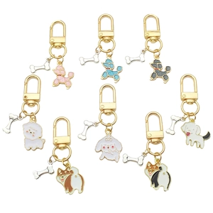 Porte-clés chien corgi dessin animé et os en U avec fermoir mousqueton doré et breloques émail