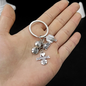 Detail view of silver basketball keychain featuring I Love Basketball heart pendant