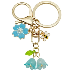 Gold bee and blue cherry blossom keychain with lily of the valley flower pendant