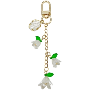 Eleganter Schlüsselanhänger Maiglöckchen mit weißen Acrylblüten und goldener Kette