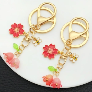 Süßer Zinklegierung Kirschblüte Maiglöckchen Schlüsselanhänger Emaille Biene Floral Rucksack Anhänger Dekorativer Schlüsselring Geschenk Damen
