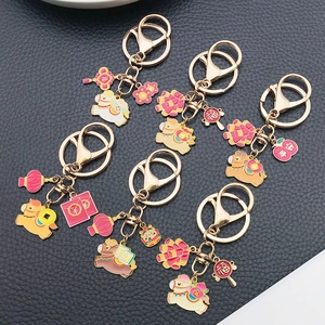 Cartoon Chinese zodiac horse keychain set with enamel lucky charms and golden metal rings