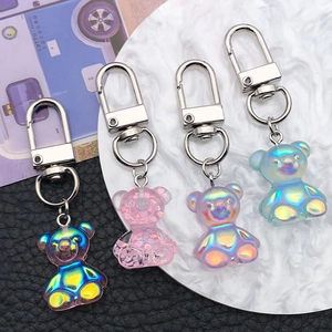 Set of four cute iridescent transparent resin bear keychains with silver lobster clasps