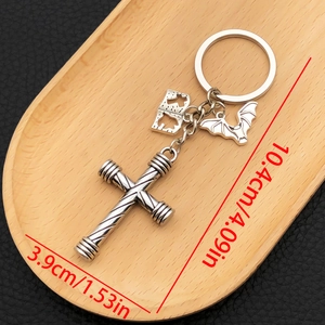 Vintage bat and cross zinc alloy keychain with stripe details and bible charm pendant