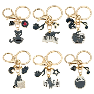 Set of six cute black cat enamel keychains with golden zinc alloy accents for bags