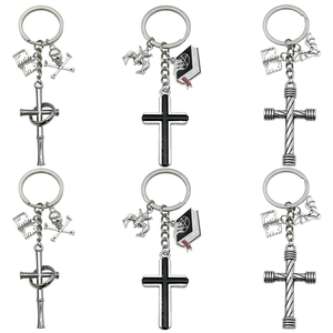 Gothic cross keychain set with skull and bat pendants in vintage silver finish