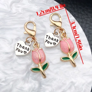 Detailed dimensions of tulip and heart pendant with silver 'Thank you' charm