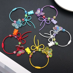 Colorful resin bear and butterfly backpack charms with letter beads in five vibrant styles
