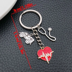 Detail showing dimensions of stethoscope and ambulance charms on medical keychain