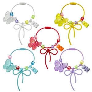 Colorful resin bear and butterfly backpack charms with letter beads in five vibrant colors
