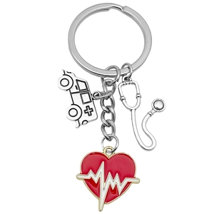Antique silver keychain with red heart stethoscope and ambulance medical charms
