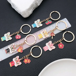 Detailed view of Chinese guardian lion keychain with colorful oil drip alloy finish