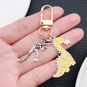 Porte-clés Dinosaure de Dessin Animé Squelette en Alliage de Zinc Fleur Émail Pendentif pour Sac Clé Voiture Unisexe Cadeau