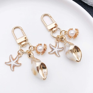 Portachiavi in Acrilico Tema Nautico Oceano Conchiglia Stella Marina Perla Artificial Lega Oro Ciondolo per Borsa Gioielli Mare Donna
