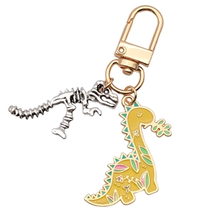 Porte-clés dinosaure mignon avec squelette de T-Rex argenté et dinosaure jaune à fleurs