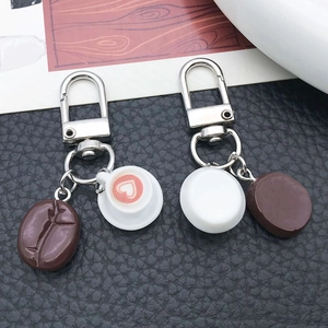 Creative resin coffee bean and white heart latte cup keychains on silver U-hooks