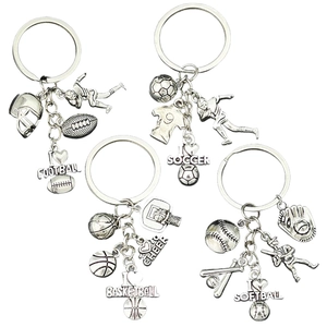 Antique silver sports keychains featuring football basketball and baseball motifs