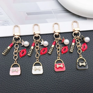 Set of 4 pearl handbag keychain charms with red lipstick and crystal lips