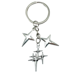 Minimalist silver star keychain with hollow and layered pendants for bags or keys