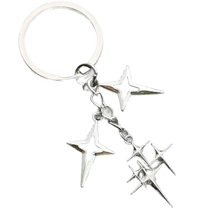 Detail of silver alloy keychain with punk style hollow star charms and layered chains