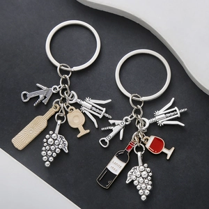 Lafite wine themed metal keychain featuring wine bottle glass and grape charms