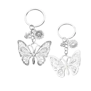 Antique silver hollow butterfly keychain with daisy and bee charms for bags and keys