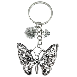 Antique silver keychain featuring hollow butterfly sunflower and bee charms for bags