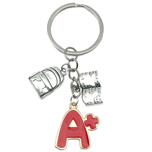 Porte-clés cartable et livre avec pendentif A+ rouge pour cadeaux de rentrée