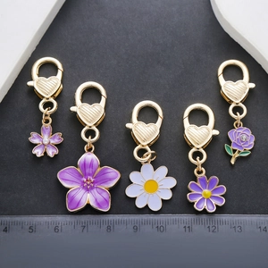 Golden heart lobster clasp keychain set with purple floral enamel charms and scale guide