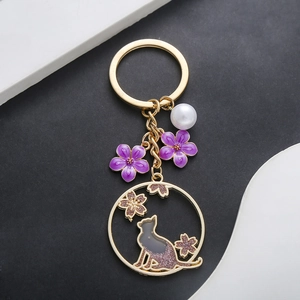 Porte-clés Couronne de Chat Fleurs de Cerisier Style Japonais Émail Fleur Imitation Künstliche Perle Alliage de Zinc Charme de Sac Femmes