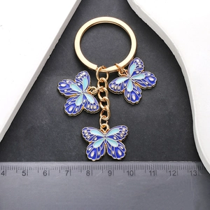 Blue enamel butterfly keychain with gold alloy metal pendants and measurements