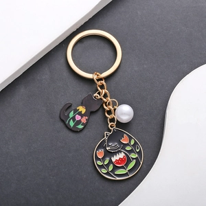 Porte-clés Mignon Chat Noir en Émail Avec Fleurs Colorées et Imitation Künstliche Perle Anneau de Clé en Alliage Doré Pendentif Sac