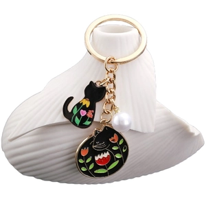 Porte-clés chat noir mignon avec breloques fleurs émaillées et perle d'imitation