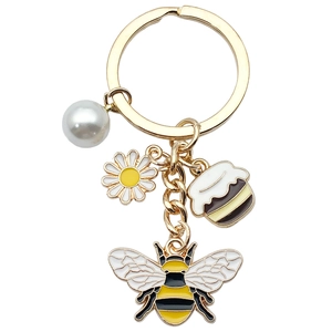 Porte-clés marguerite et abeille mignon avec perle et pendentif pot de miel doré