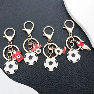 Miniature football keychain set with gold finish sports charms for backpacks