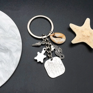 Porte-clés en argent antique avec tortue de mer, hippocampe, conque et pendentif coquillage