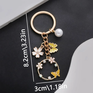Elegant Hollow Yellow Butterfly Artificial Pearl Keychain Gold Zinc Alloy Enamel Flower Bag Charm Accessory For Women Girls Gift