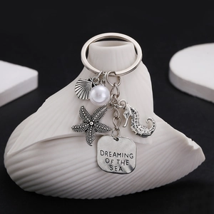 Porte-clés étoile de mer hippocampe argent rétro avec perle et breloque océan