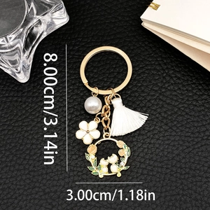 Simpatico Portachiavi con Gatto Bianco e Ghirlanda di Fiori Lega d'Oro Smalto Nappina Perla Artificial Ciondolo Borsa per Donna Ragazza