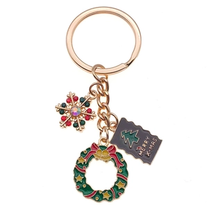Porte-clés de Noël avec flocon de neige, couronne et breloque Merry X-Mas dorée