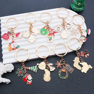 Christmas keychain set with Santa Claus, Reindeer and Xmas tree charms in gold finish